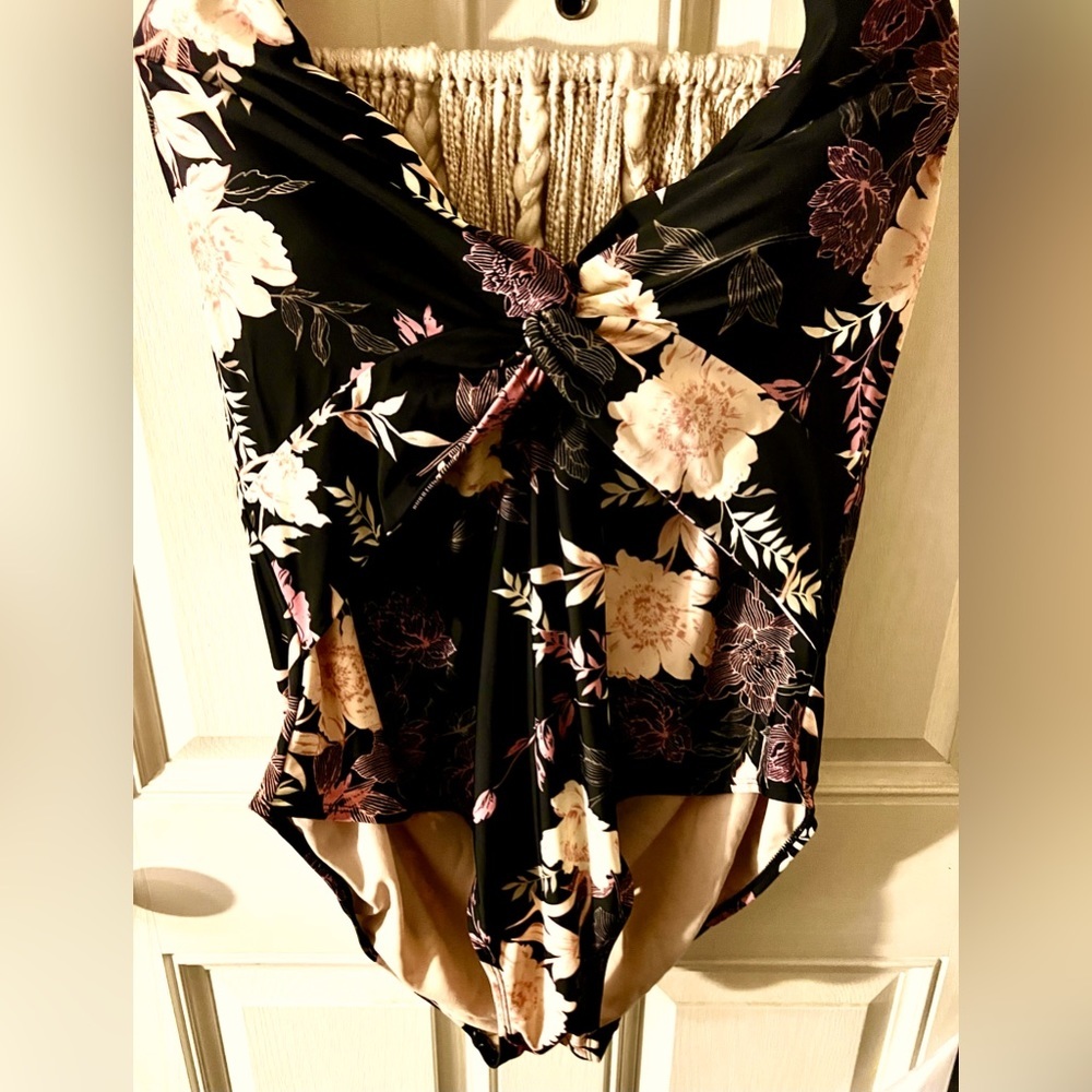 Plus figure flattering black & pink floral one piece. Size 24W